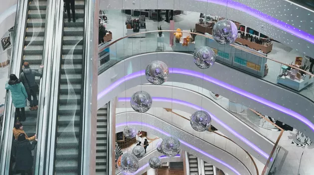 mall interior with multiple levels, escalators, and a secure shopping environment supported by advanced retail security technology