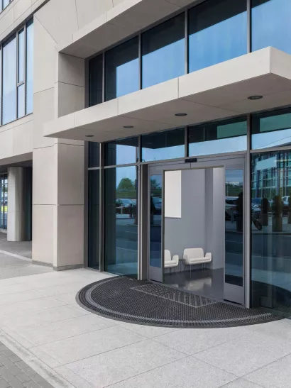 Closeup of a glass entrance to office building